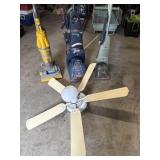 3 vacuums and ceiling fan