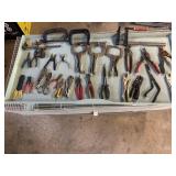 Assortment of pliers, clamps, and more
