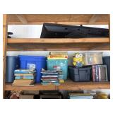 Shelf of Childrenï¿½s Books, Toys, VHS, & More