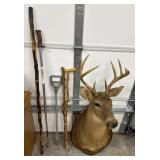 Wooden basket, walking sticks, and more