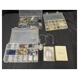 4 containers of costume jewelry