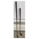2 antique wooden handle left handed golf clubs