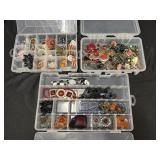 3 containers of assorted costume jewelry
