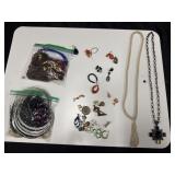 4 ziplock bags of miscellaneous costume jewelry