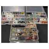 3 containers of assorted costume jewelry