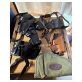 Holsters and magazine pouches