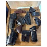 Mostly leather holsters and magazine pouches