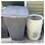 Outdoor trash can and plastic barrel with hose