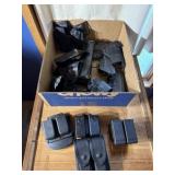 Box of miscellaneous holsters and magazine pouches