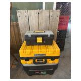 Three toolboxes with a wooden dolly