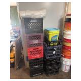 Nine milk crates, roll of plastic.