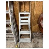 2 wooden step ladders