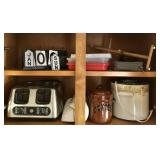 Contents of Cabinet Above Refrigerator