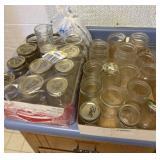 Large assortment of canning jars