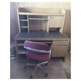 Office desk, rolling chair and chair pad