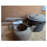 Homemade anvil, kettle and blue enamel pot