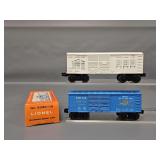 Two Lionel Box Cars with One Original Box 6044 6050