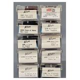 Ten Atlas N Scale freight cars in clear cases