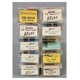 Ten Atlas N Scale Cabooses in Clear Cases