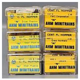 Six AHM Minitrains N Scale Centerflow Hoppers in Clear Cases