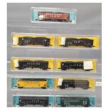 Nine Atlas N Scale Hopper Cars in Clear Cases