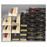 Twenty-seven Bachmann N Scale Freight Cars with one Diesel Locomotive in Clear Cases