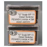 Two Con-Cor N Scale Pennsylvania MP-15 Diesel Switchers in Clear Cases