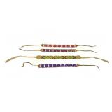FOUR MOOSEHIDE BEADED CHOKERS WITH TIES