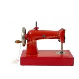 VINTAGE CHILD'S RED SEWING MACHINE