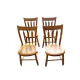 SET OF FOUR PRIMITIVE ARROWBACK CHAIRS
