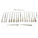 TWENTY STERLING HANDLED BUTTON HOOKS