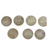 SEVEN CANADIAN 1959-1964 SILVER DOLLAR COINS