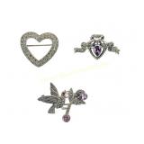 THREE STERLING AMETHYST & MARCASITE BROOCHES