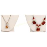 TWO STERLING AND AMBER NECKLACES