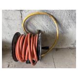 Orange air hose on reel