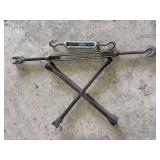 2 turn buckles and tire iron