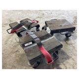 Three snowmobile dollies