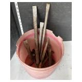 Pail of chisels, misc