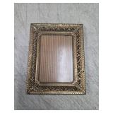 vintage brass or gold-tone metal picture frame