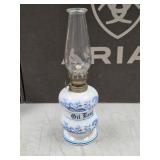 ceramic oil lamp features a Delft-style blue and