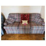 Plaid sofa w/ decorative throw pilows