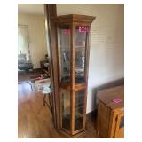 Lighted, flat back curio cabinet from Pulaski