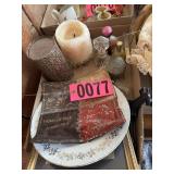 Flat of decorative plate and cloth, candles,