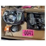 Sony 12x Cybershot camera w/ case and Bushnell