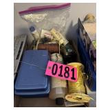 Flat of crafting ribbon and soap supplies