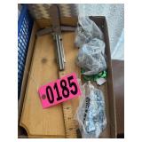 Flat of wood cutout, measuring tool, chain links