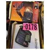 Flat of portable heat pack and desktop telephone