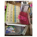 Flat of medical supplies: pill sorters, orthotic