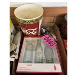 Flat of Coca Cola collectibles, trash can,
