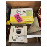 Flat of metal brackets, waterproof tape, and